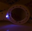 تصویر  ذره بین و لوپ دستی چراغ دار  9586 LED-UV - لمسی دور لامپ كامار (چین) 60mm 4X